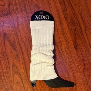 XOXO brand legwarmers in a white or ivory color